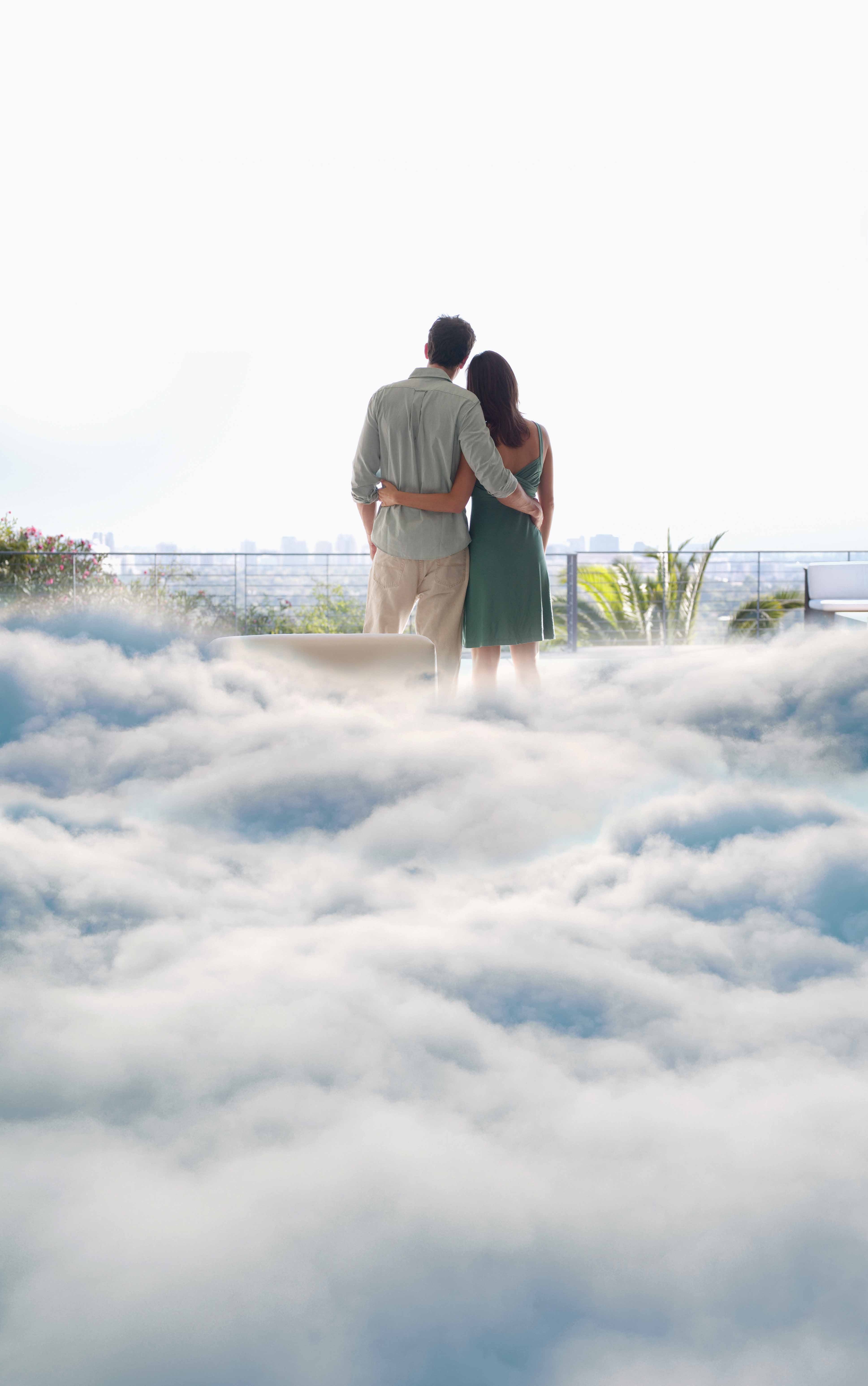 High-rise balcony view above the clouds