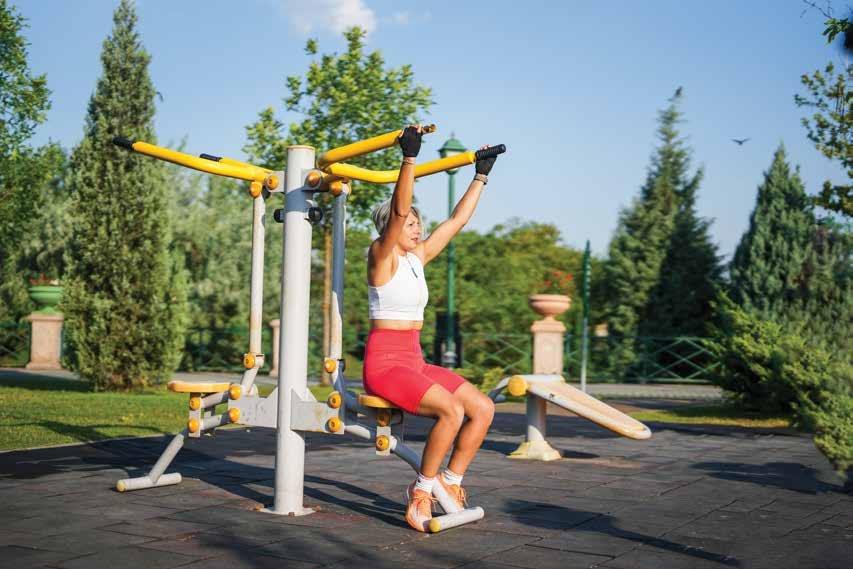 Outdoor fitness station in landscaped greens